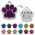Ibera Gifts - Chapa Perro Grabada en Forma de Pata con Purpurina, Placa Perro Personalizada para Perros y Gatos Pequeños y Medianos, Tamaño 24 mm x 27 mm, Chapa Identificativa Perro y Gato (Azul)
